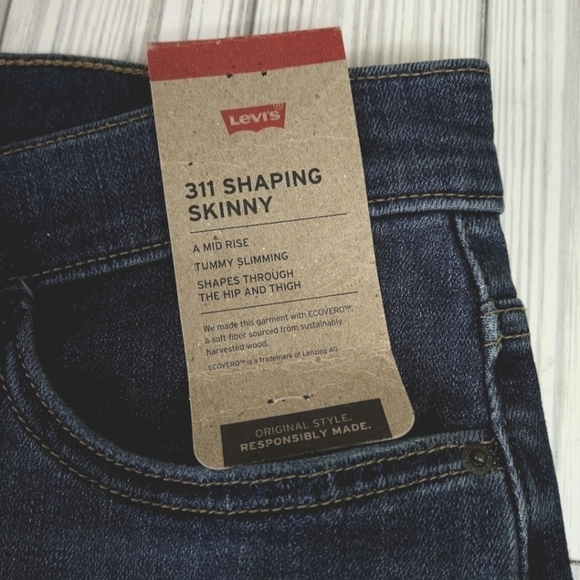 Levi's 311 Mid Rise Shaping Skinny Jean in Medium Wash Blue Size 27 NWT - Picture 10 of 12